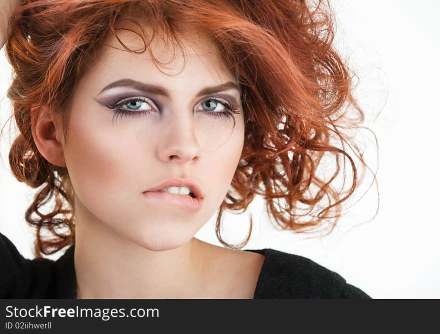 Young pretty girl portrait with red hair