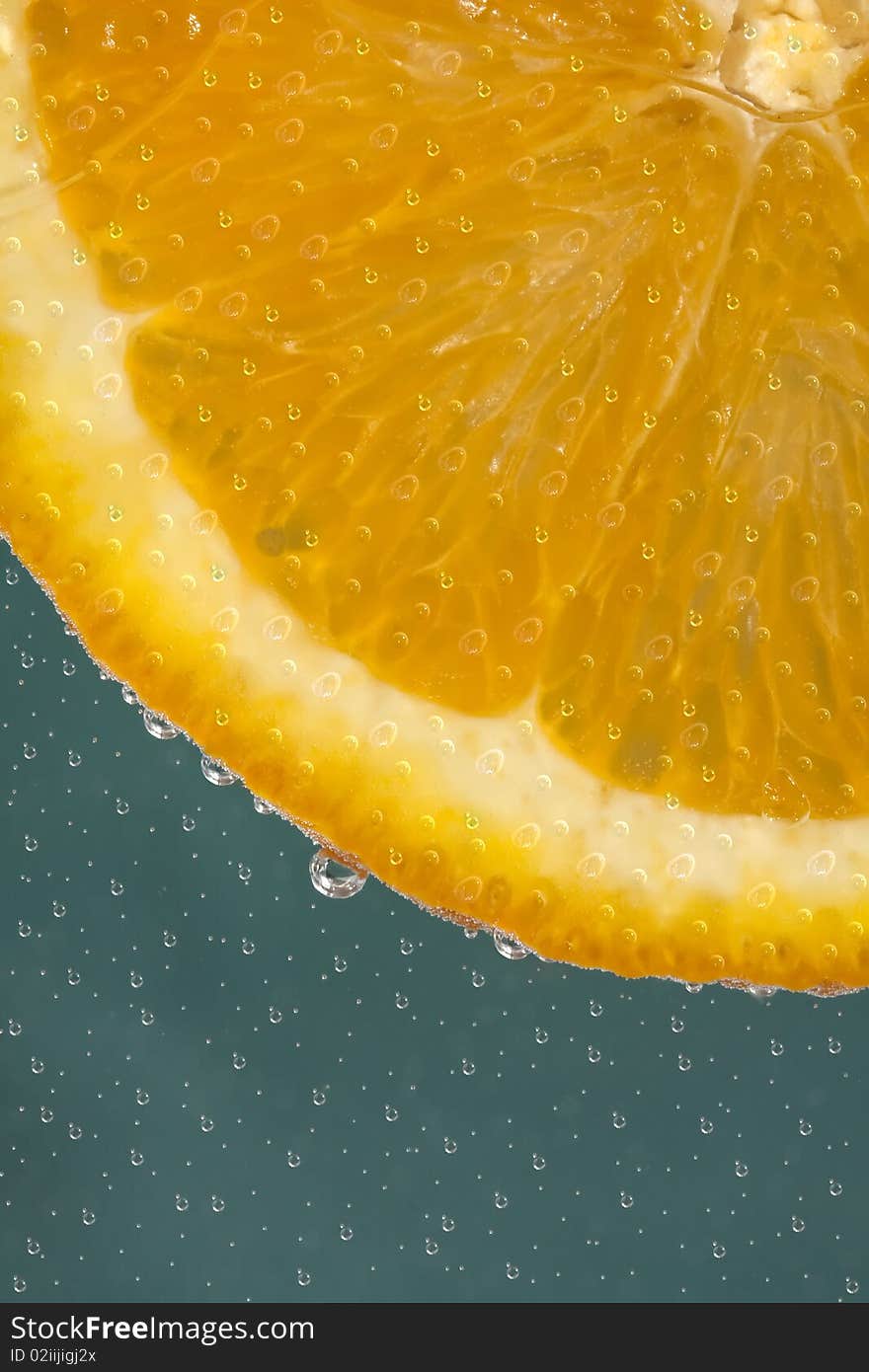 Close up on an orange slice. Close up on an orange slice.