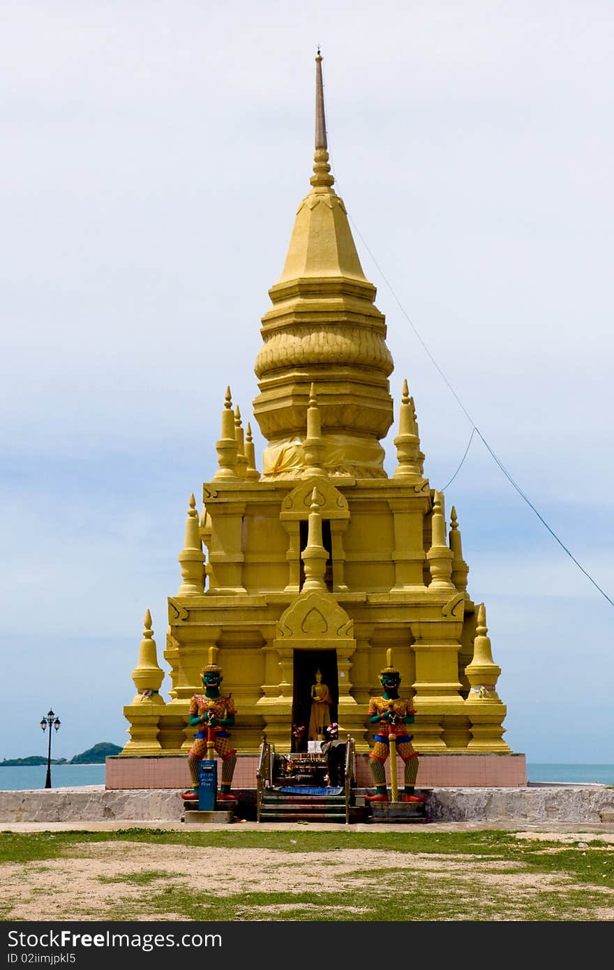 Golden Pagoda On Seashore