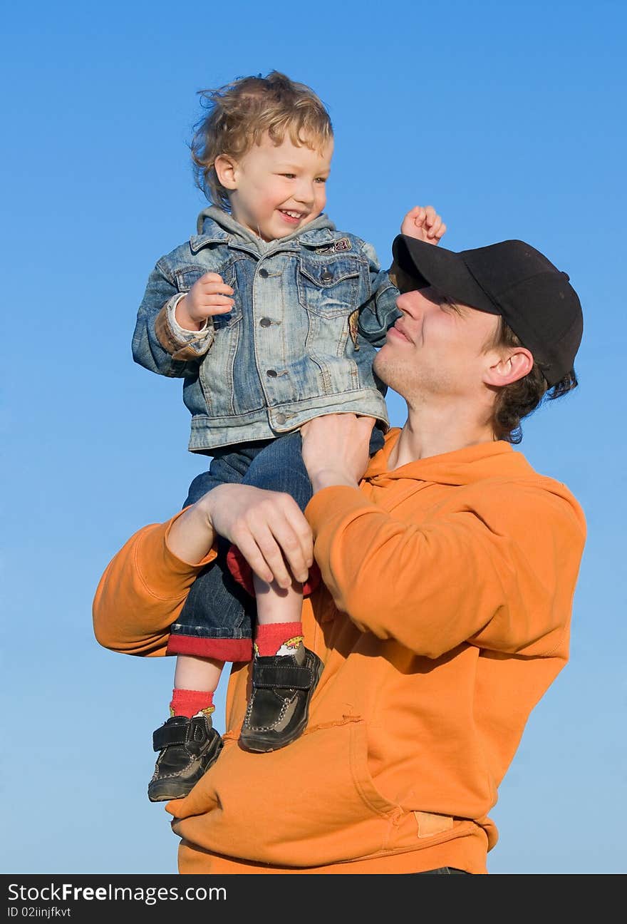 Happy family with children outdoors on a sunny day