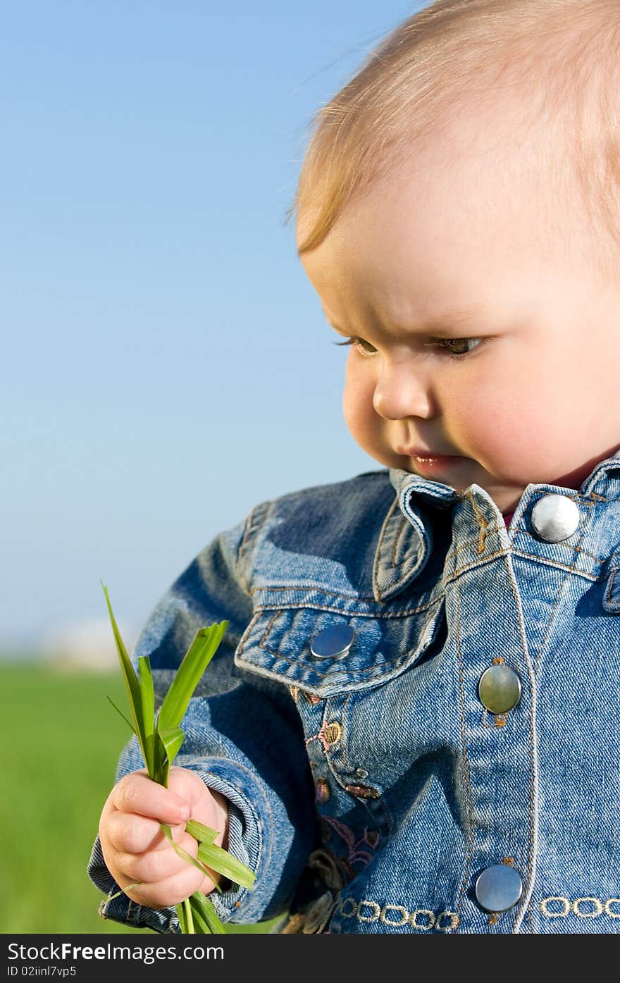 Portrait of little girl in the field