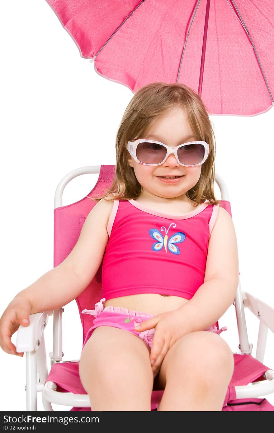 Little girl on the beach isolated