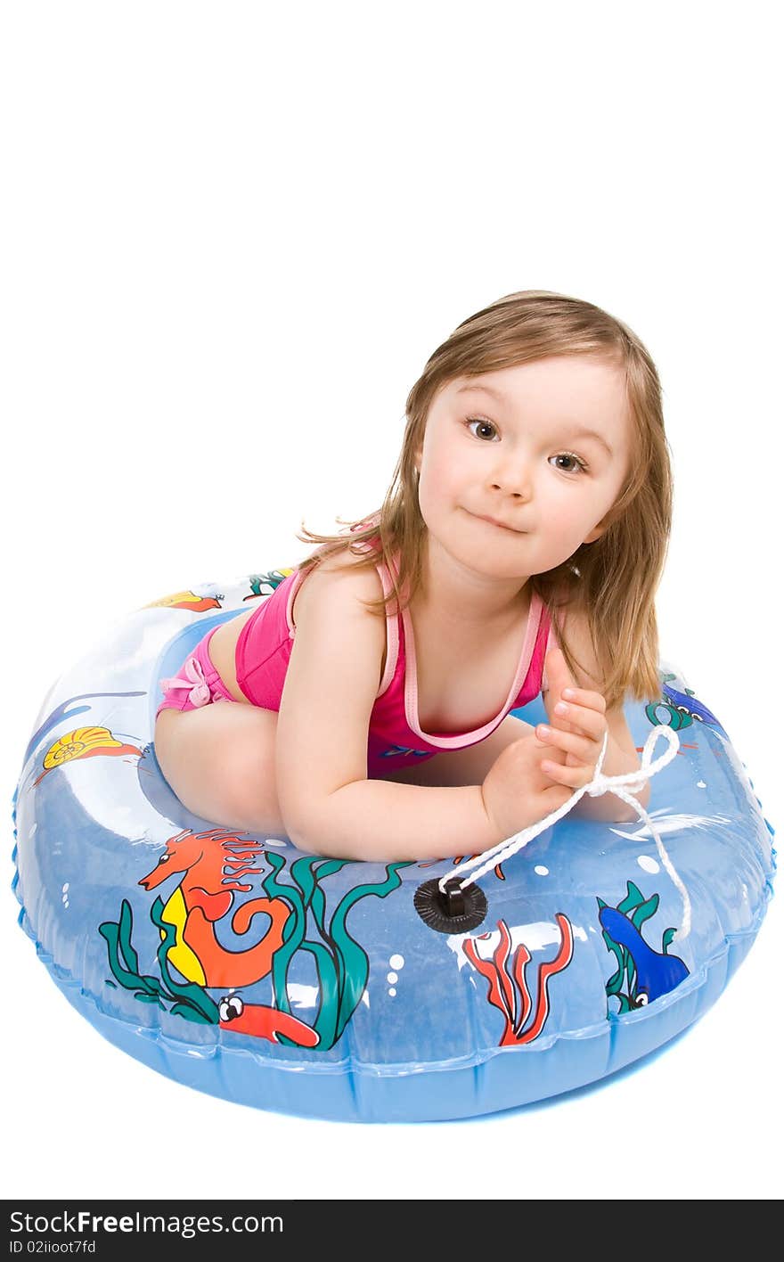 Little girl on the beach isolated