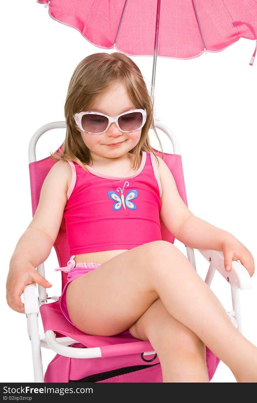 Little girl on the beach isolated