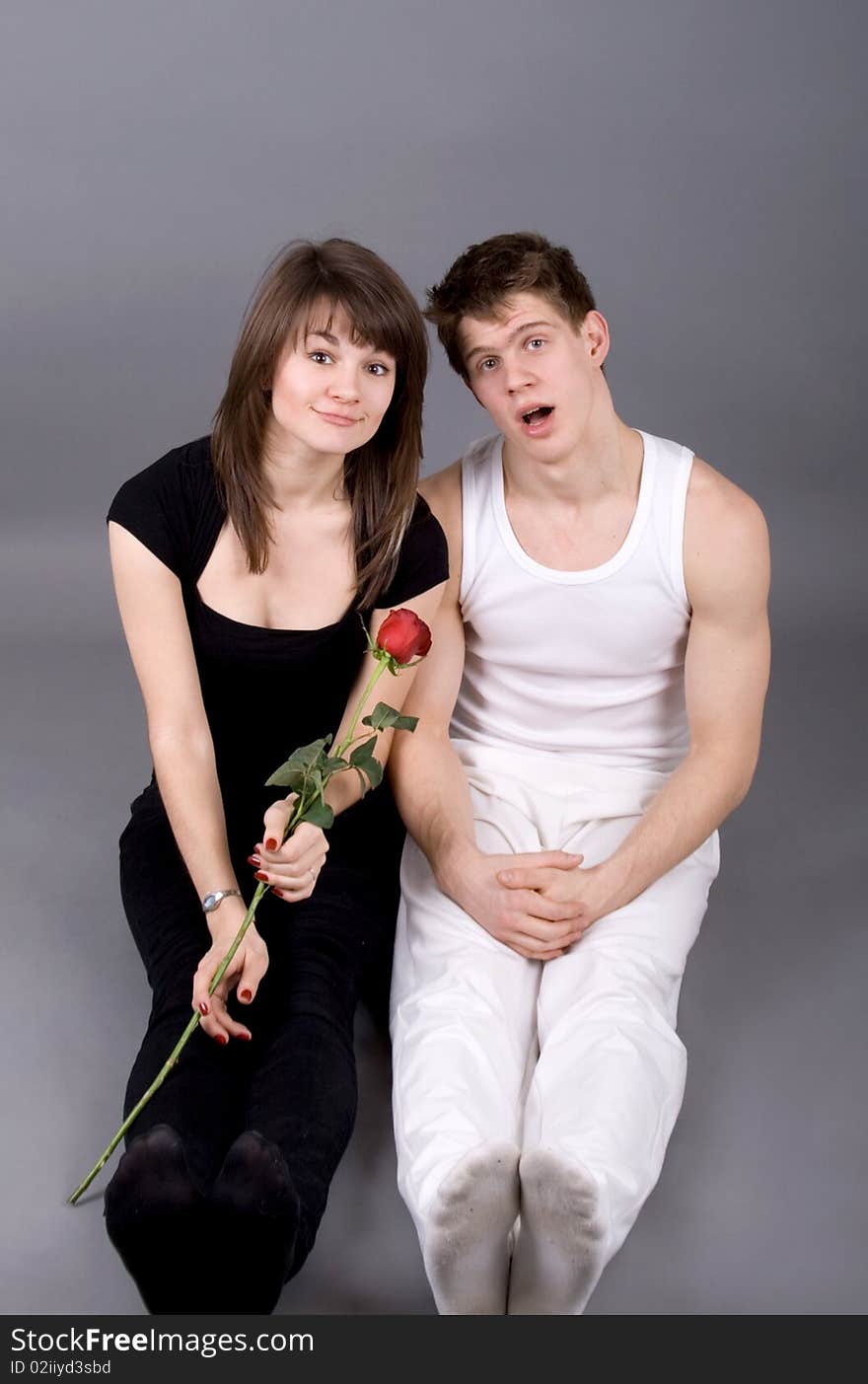 Funny couple posing in studio