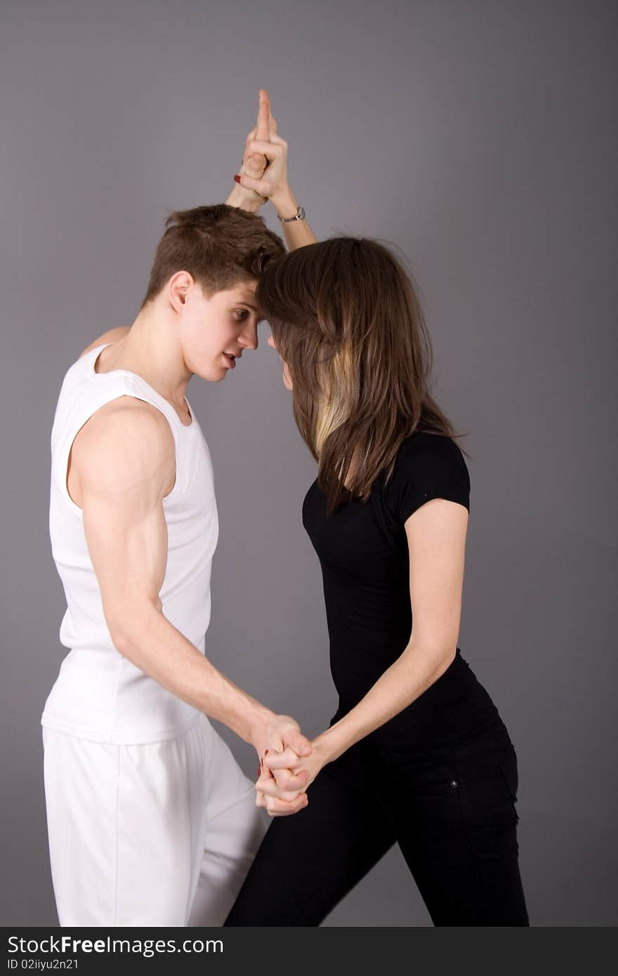 Dancing couple posing in studio