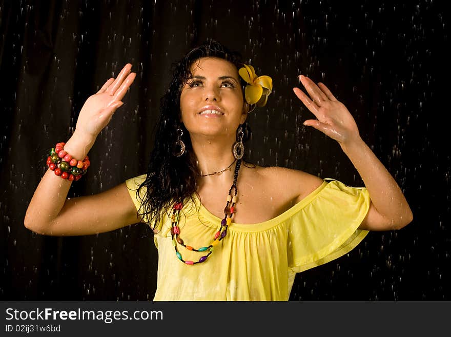 Closeup  portrait of a sexy woman in water studio