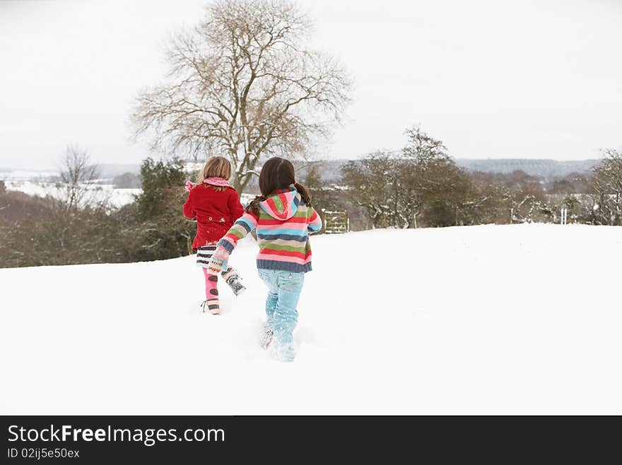 Group Of Children Having Fun In Snow