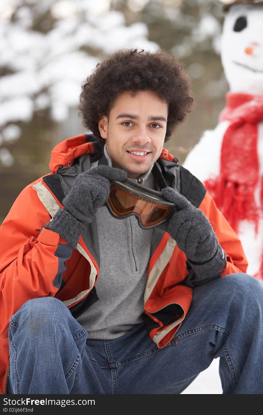 Man Wearing Winter Clothes In Snow