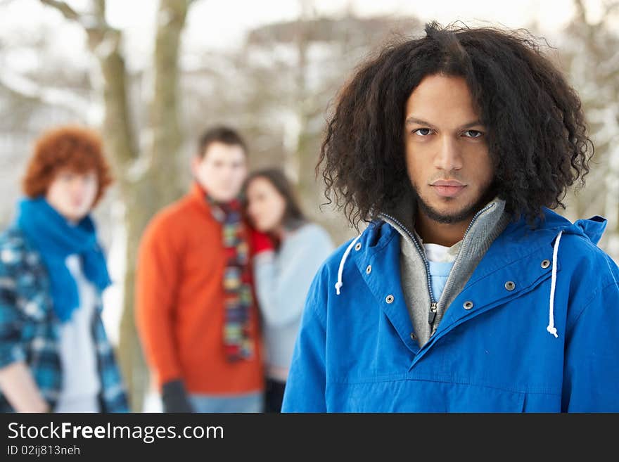 Teenage Friends Having Fun In Snowy Landscape