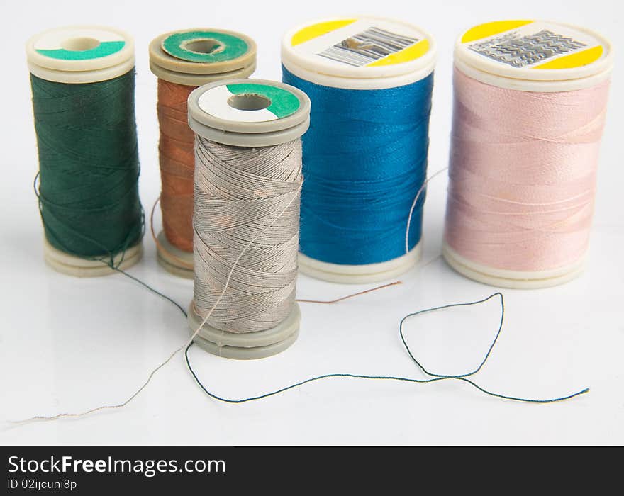 Sewing reels isolated in white background