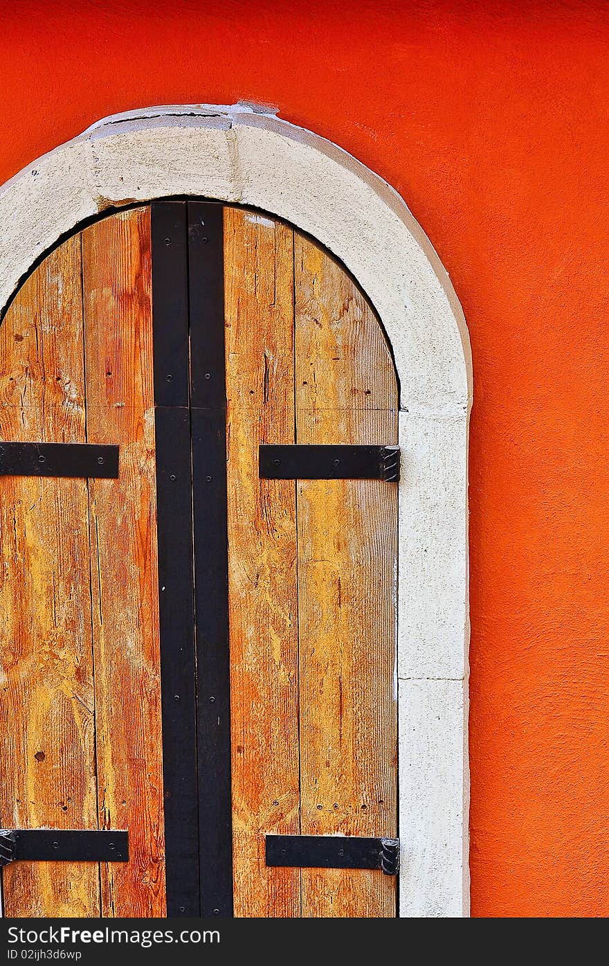 Modern door on orange wood. Modern door on orange wood