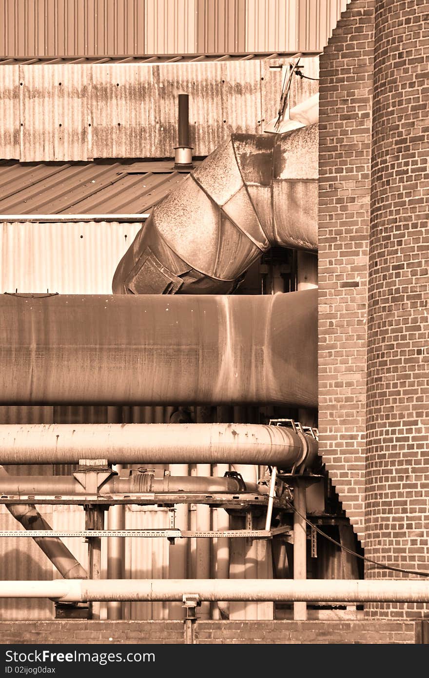 Part of the Heat and Gas Pipes of a modern Furnace to Produce Steel Old Furnace seen from below sepia. Part of the Heat and Gas Pipes of a modern Furnace to Produce Steel Old Furnace seen from below sepia