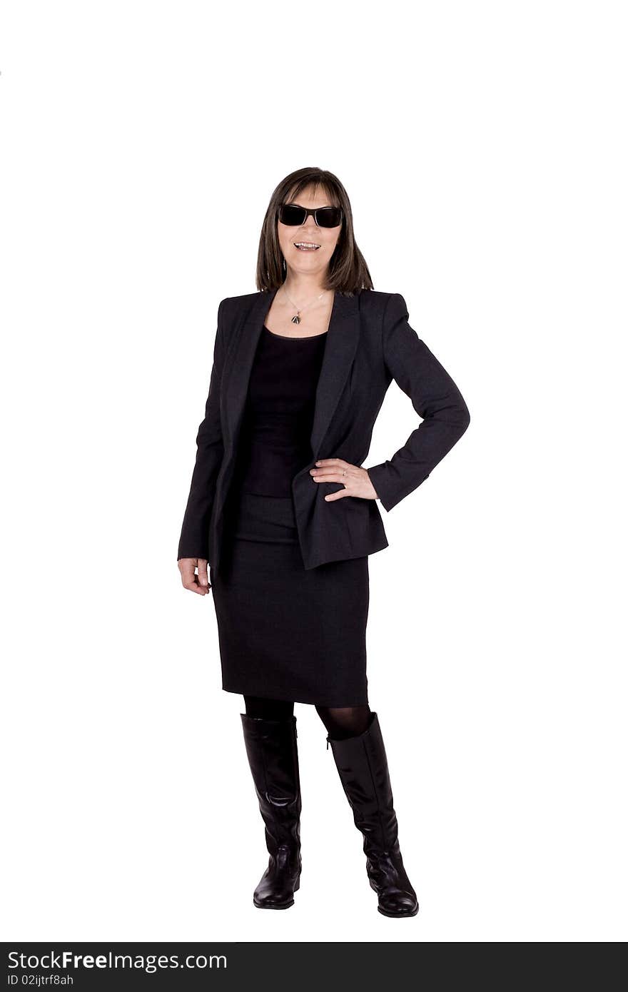 Succesful senior business woma wearing a suit and sun glasses. Succesful senior business woma wearing a suit and sun glasses