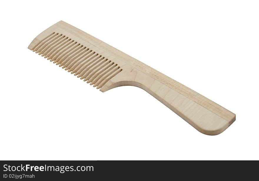 Wooden comb isolated on a white background