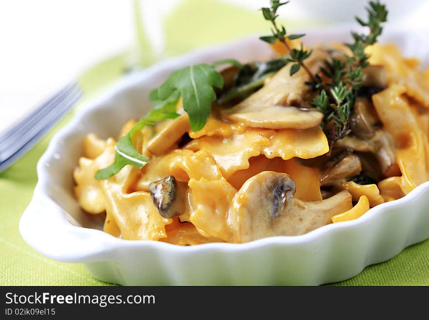 Farfalle with mushrooms and cream sauce - detail