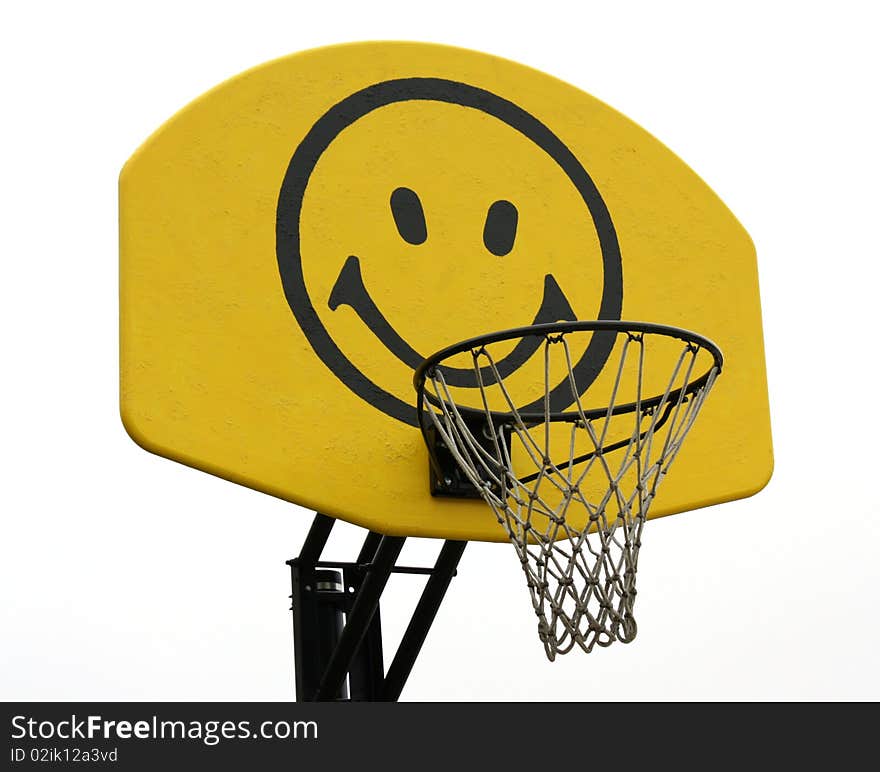 A yellow backboard with a smiley face. A yellow backboard with a smiley face.