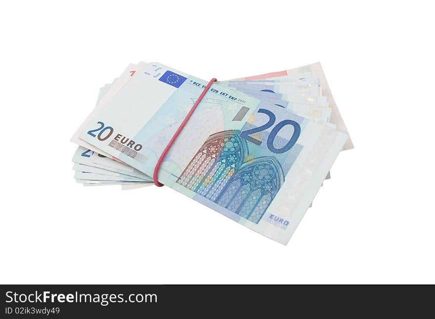 Euro banknotes with a rubber isolated on a white background. Euro banknotes with a rubber isolated on a white background