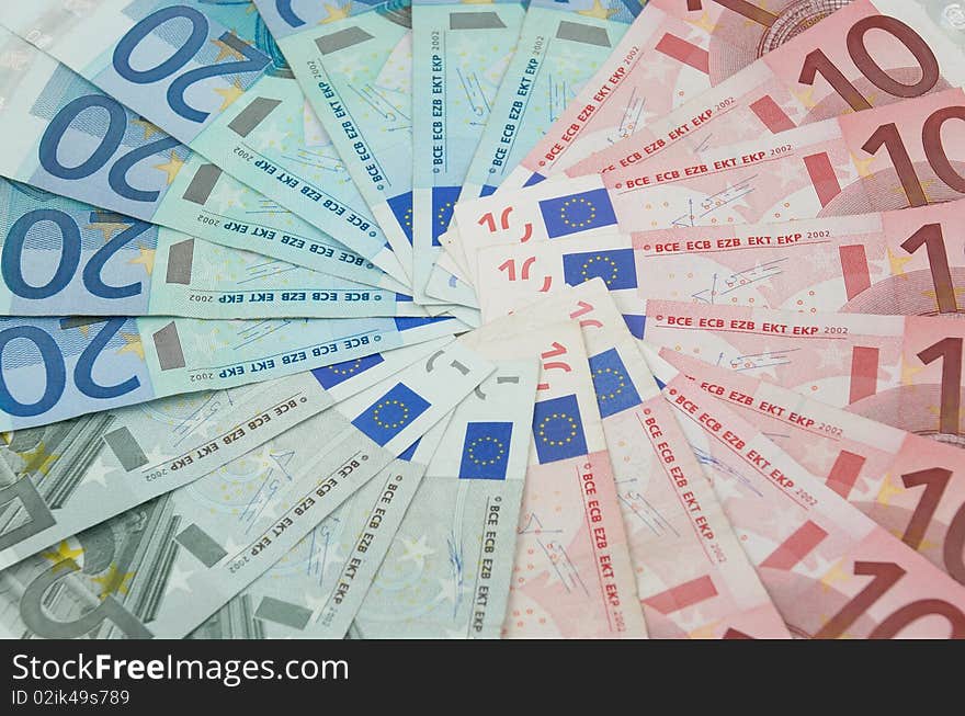 Five, ten and twenty euro banknotes background. Five, ten and twenty euro banknotes background