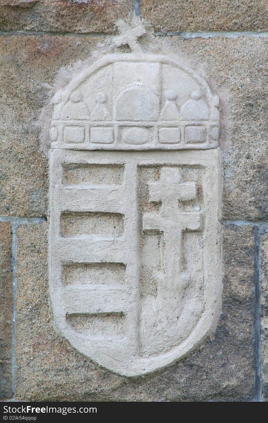 Hungarian blazon on a stone wall. Hungarian blazon on a stone wall.