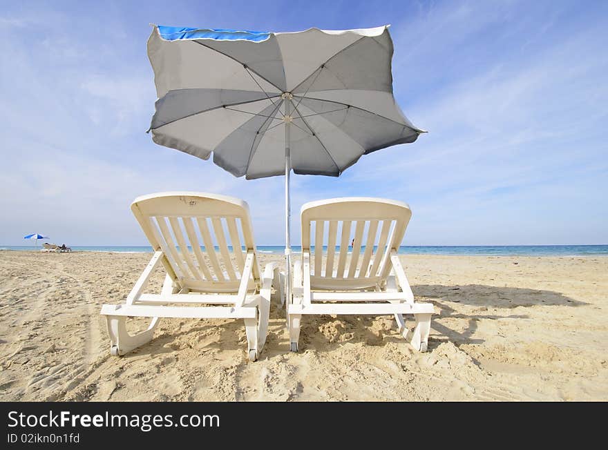 Chairs and umbrella on tropical cuban beach