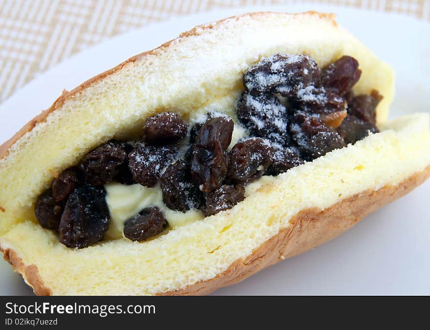 Delicious pastry made with black raisins and cream. Delicious pastry made with black raisins and cream