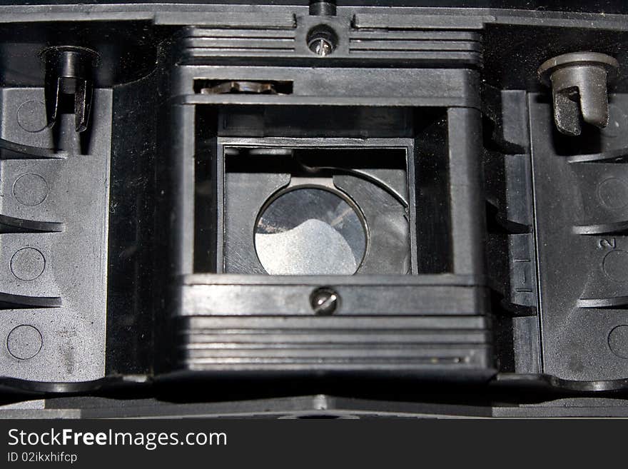 A glance inside an old classic photo camera. A glance inside an old classic photo camera