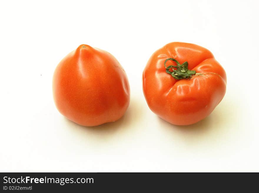 Fresh tomatoes, isolated in the white background