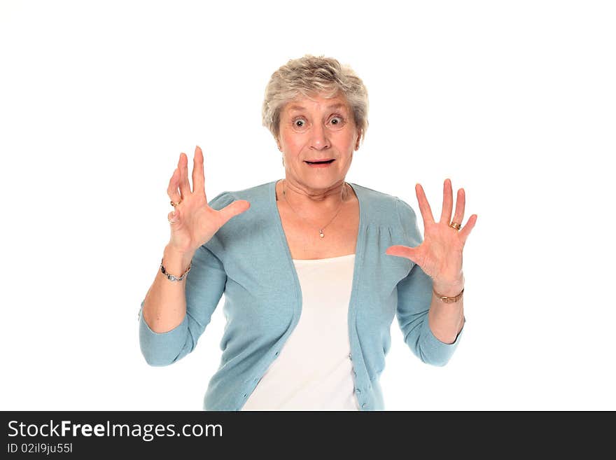 Senior older woman looking surprised