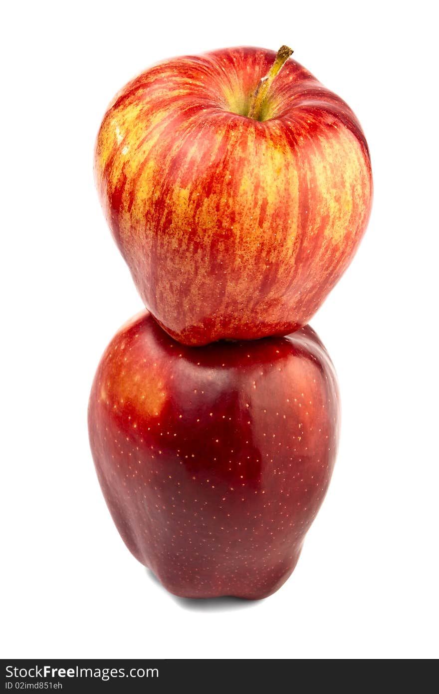 Pyramid of two apples on white background. Pyramid of two apples on white background