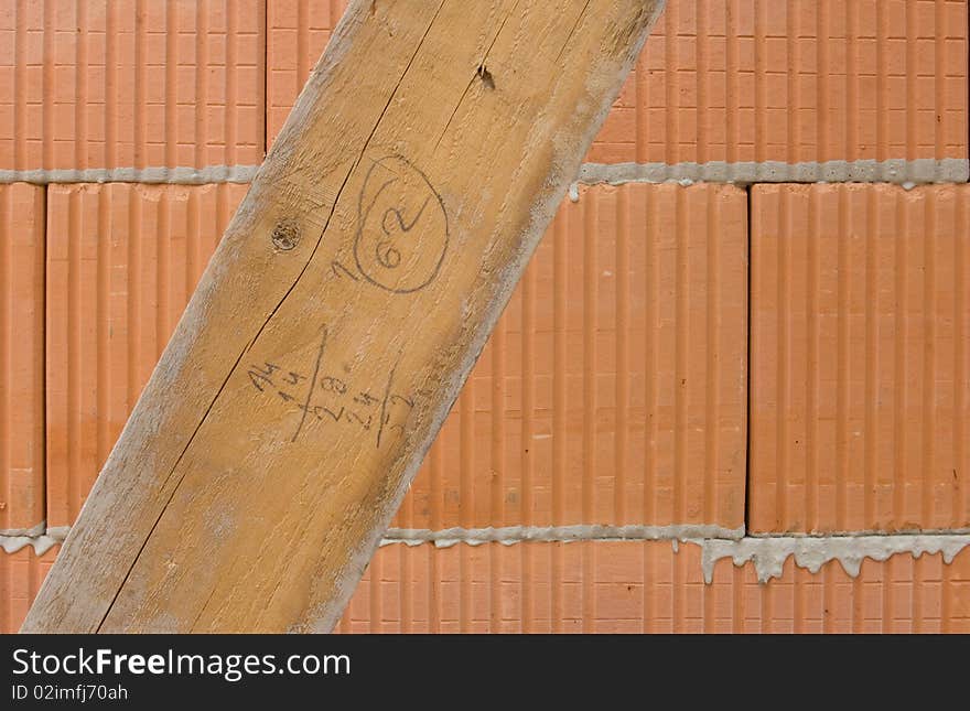 Hohlziegel-Wand mit Skizzenbrett Hollow brick wall with board. Hohlziegel-Wand mit Skizzenbrett Hollow brick wall with board