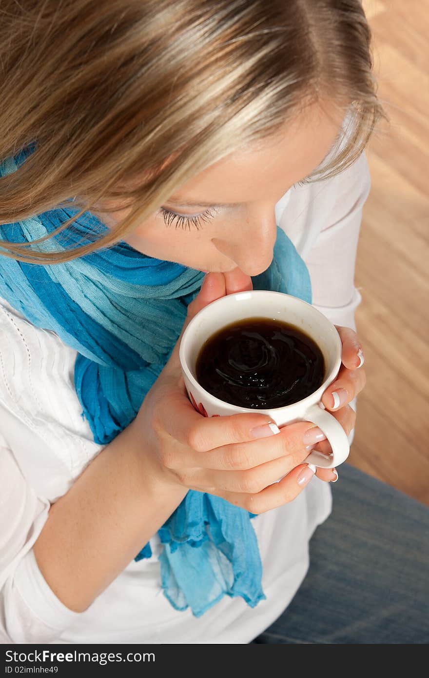 Caucasian woman with cup of coffee