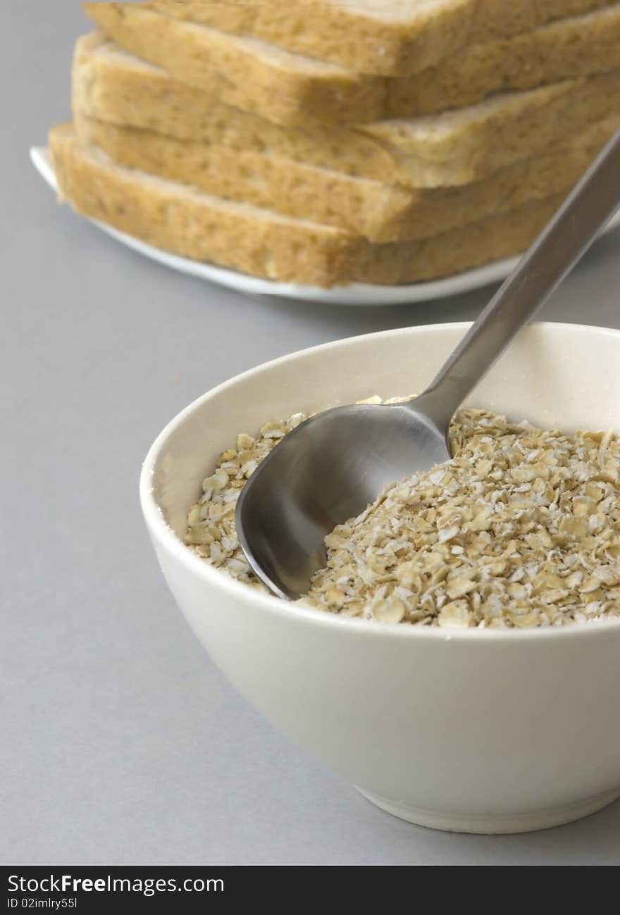 Bowl with oats, isolated on the white