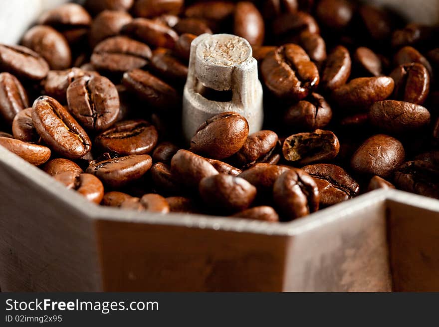 Photo of zoomed brown coffee beans which are all closed to each other