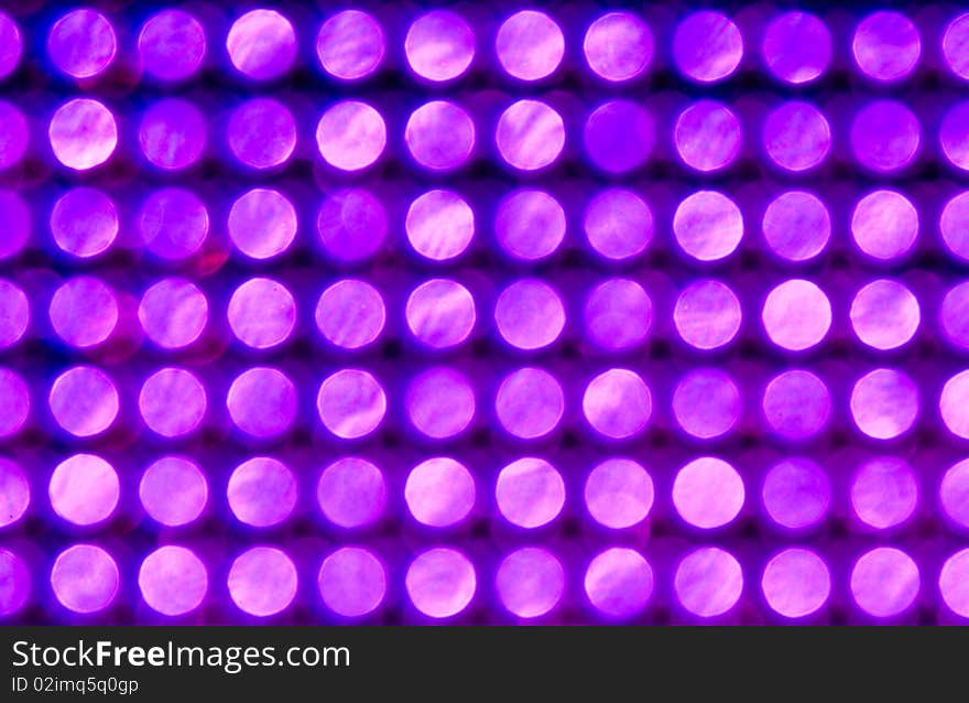 Blurry pattern of purple decoration lights. Blurry pattern of purple decoration lights.