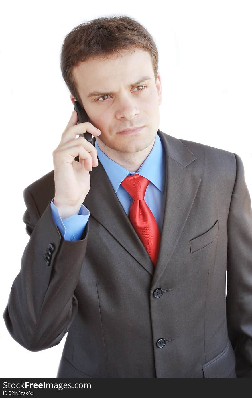 The businessman speaking by phone