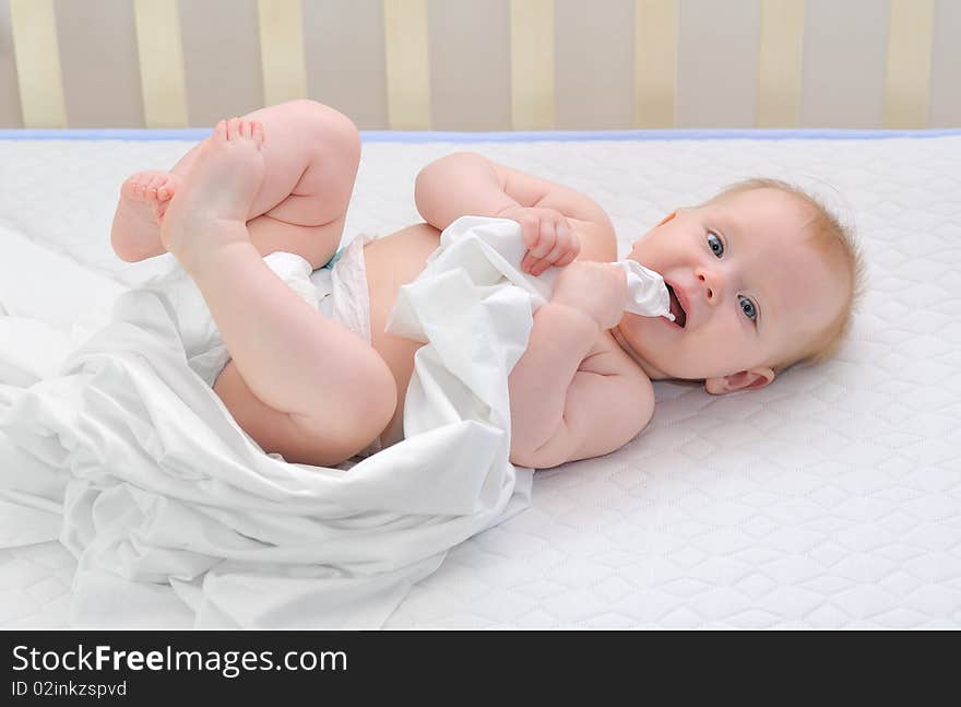 Little baby under white towel. Little baby under white towel.