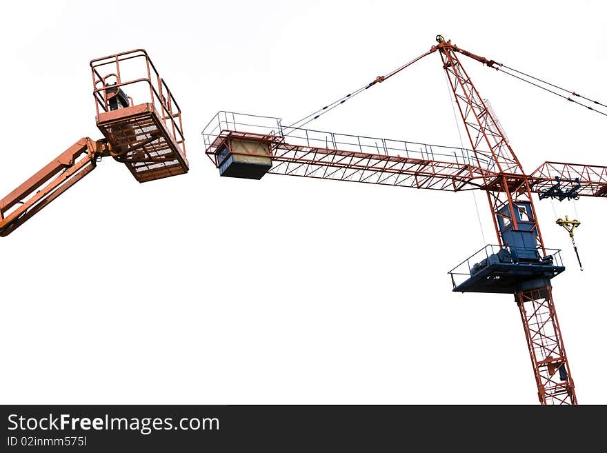 Crane and cherry picker against a white back ground