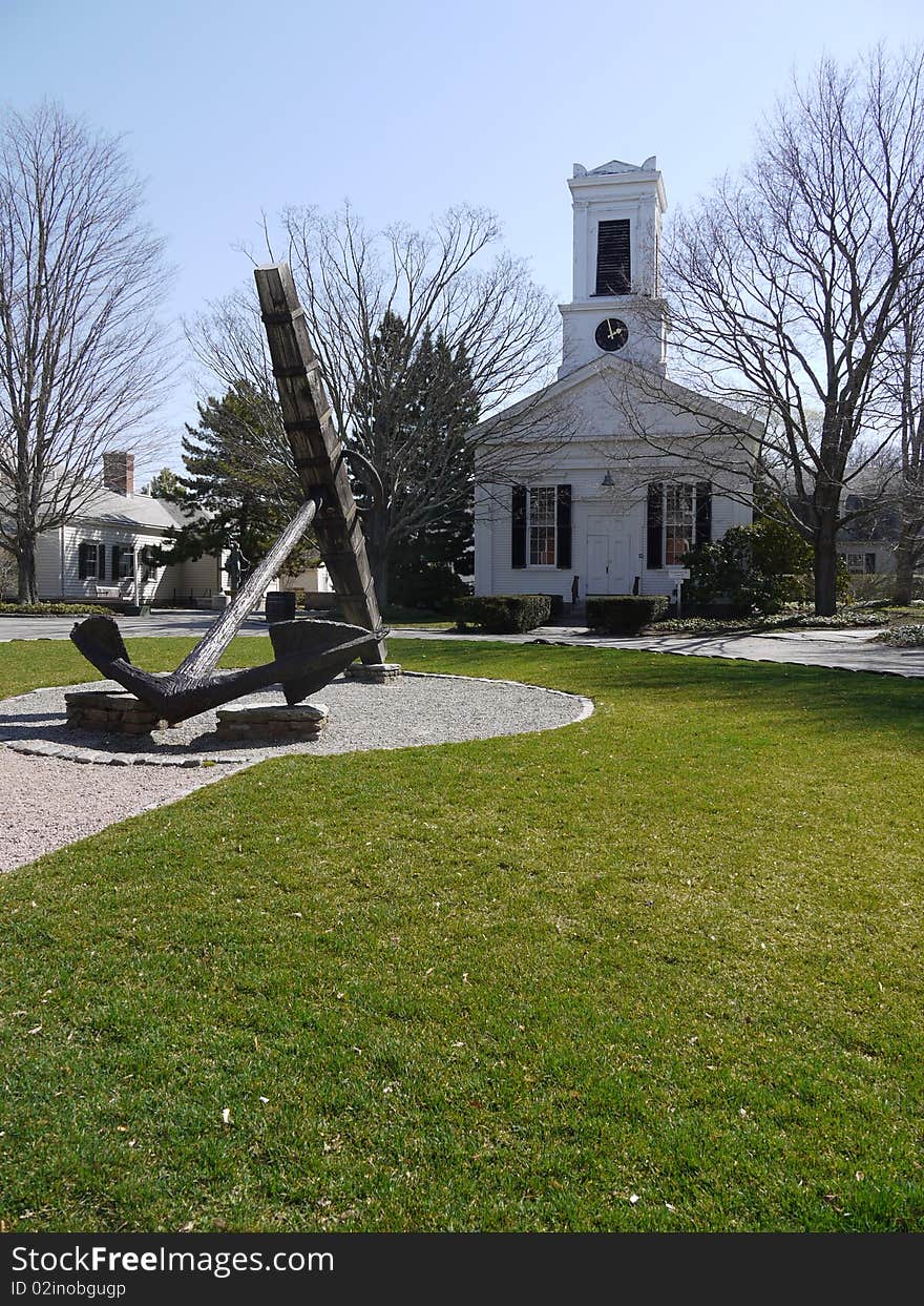 Wooden church and huge anchor in Mystic Seaport, Connecticut. Wooden church and huge anchor in Mystic Seaport, Connecticut