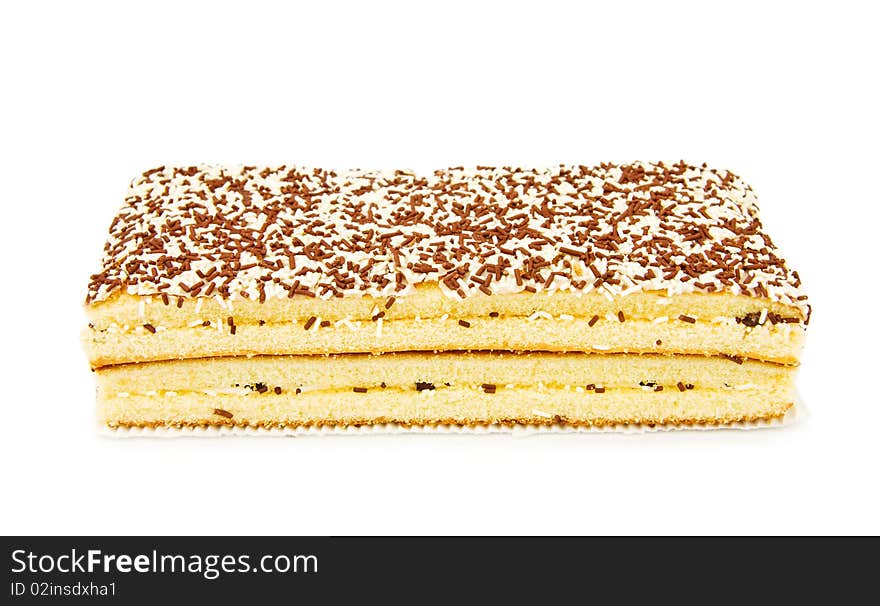 Coconut and chocolate sponge cake. Isolated over white background. Coconut and chocolate sponge cake. Isolated over white background.