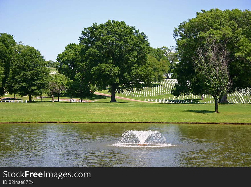 A fountain in a pond at the National Cemetery in Chattanooga, TN. A fountain in a pond at the National Cemetery in Chattanooga, TN