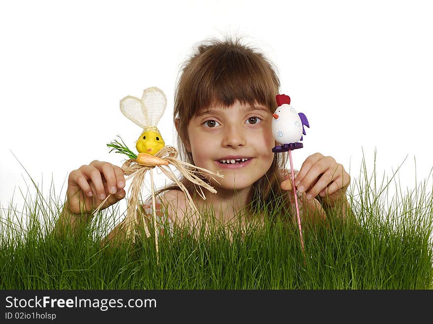 Girl with puppets on the grass. Girl with puppets on the grass