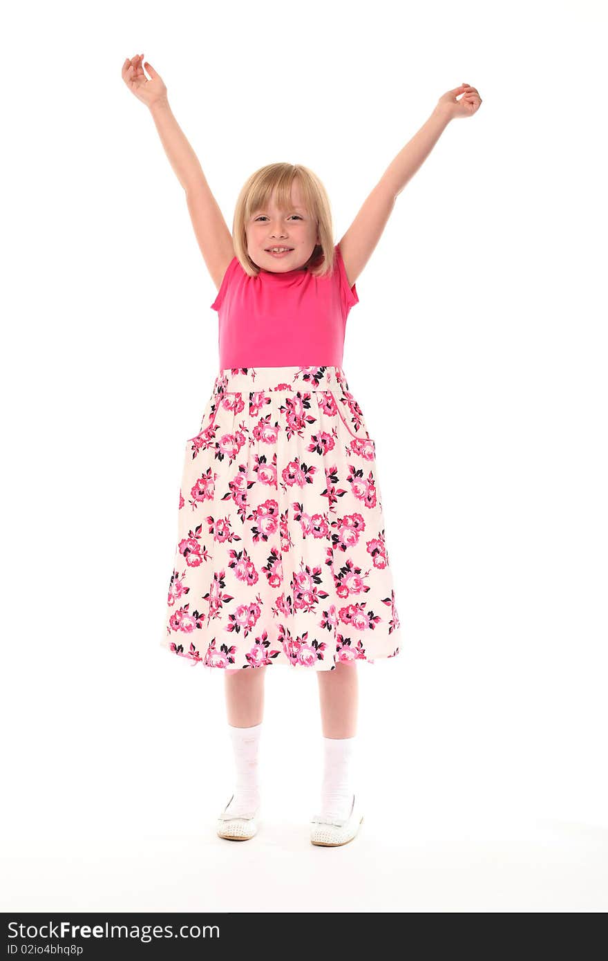 Young little girl with arms up looking happy. Young little girl with arms up looking happy