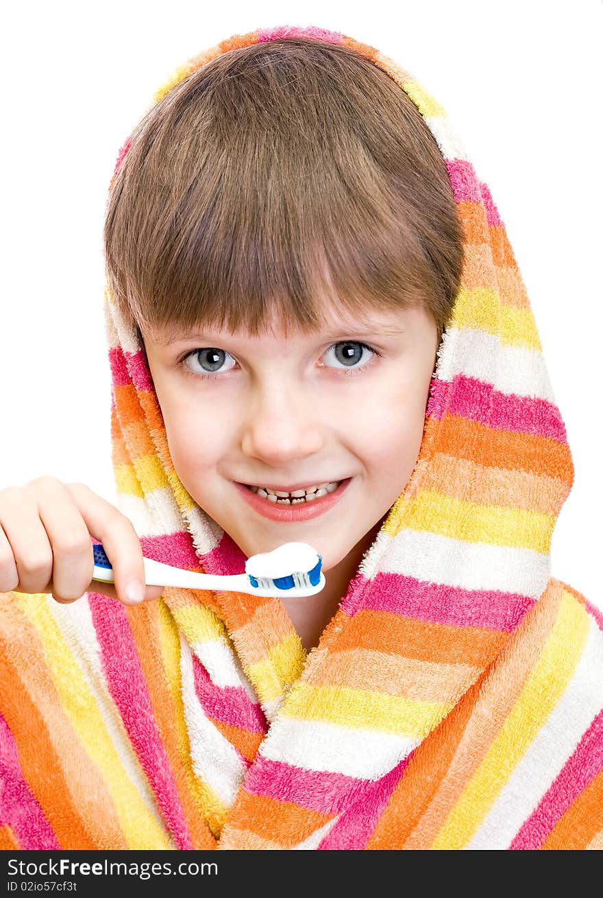 Beautiful boy brushing teeth, isolated on white background