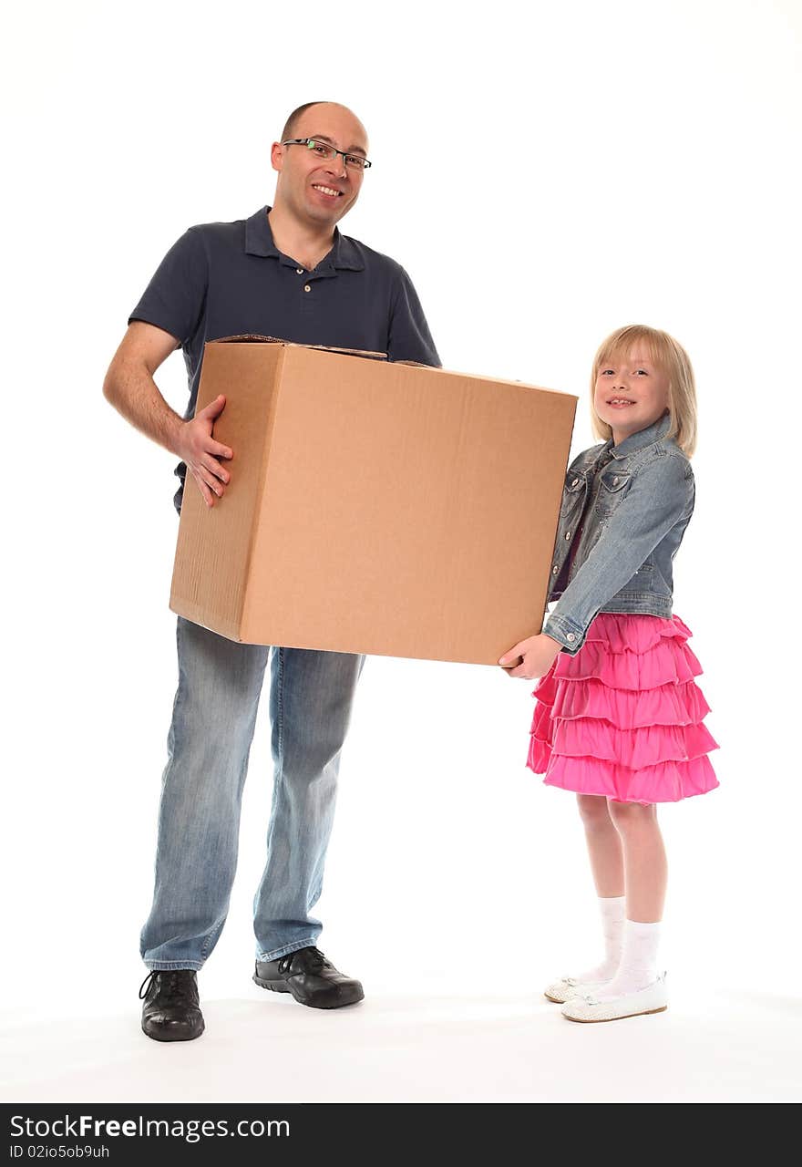 Young little girl carrying large box with father. Young little girl carrying large box with father