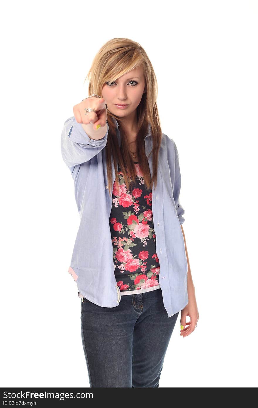 Attractive young teenage girl pointing