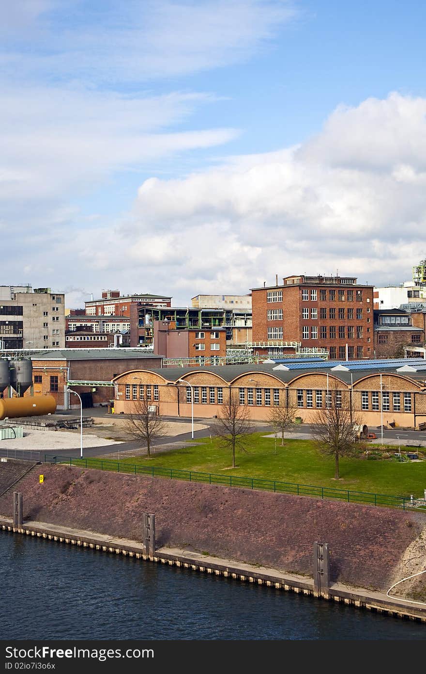 Old industrial building with bricks and river