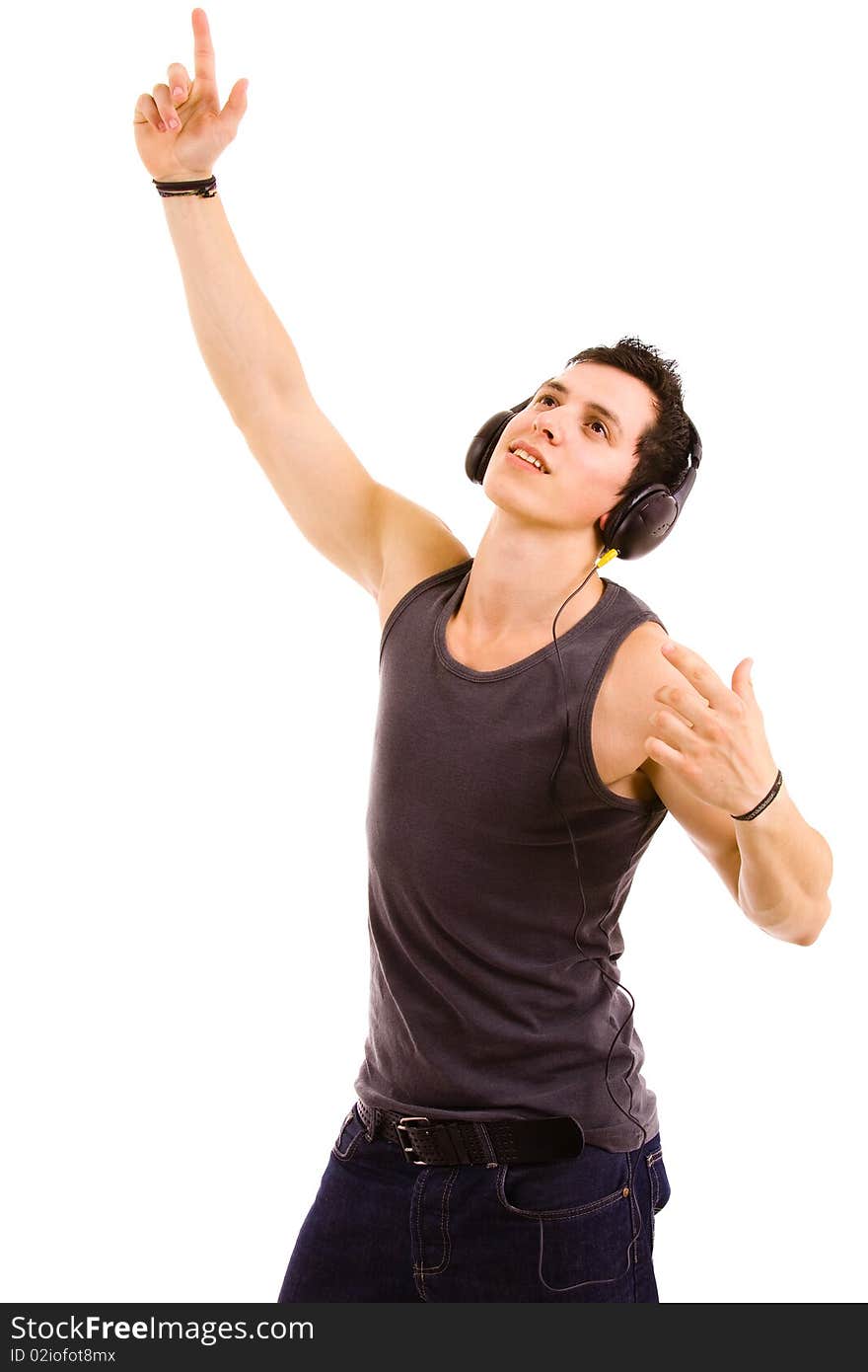 Young man listening music isolated on white