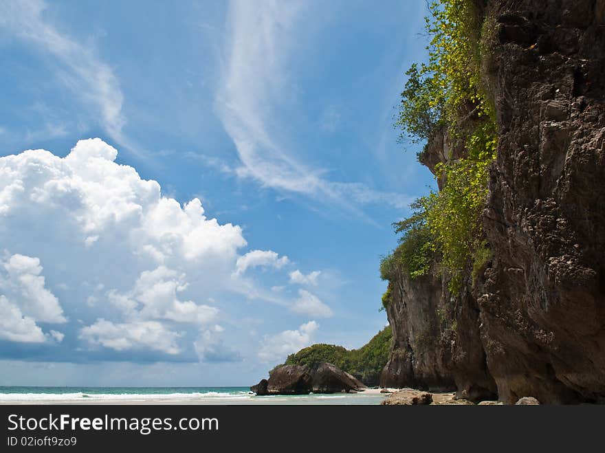 Rock under blue sky and white clound. Rock under blue sky and white clound