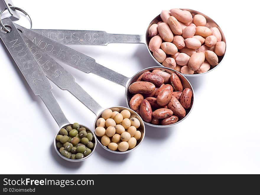 Seed and bean on unique spoon